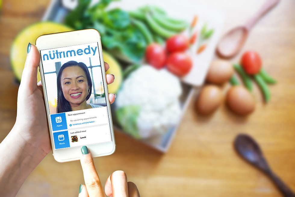 Nutrimedy App on the phone with user clicking the meal log